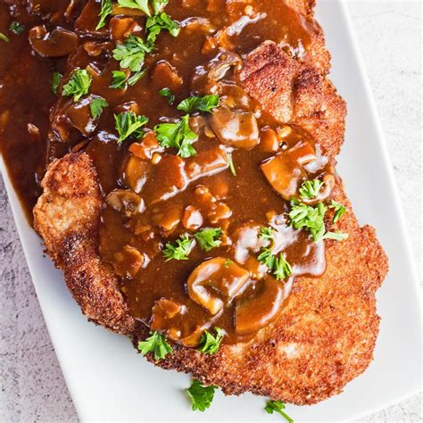 Jägerschnitzel (Schnitzel with Mushroom Gravy  .